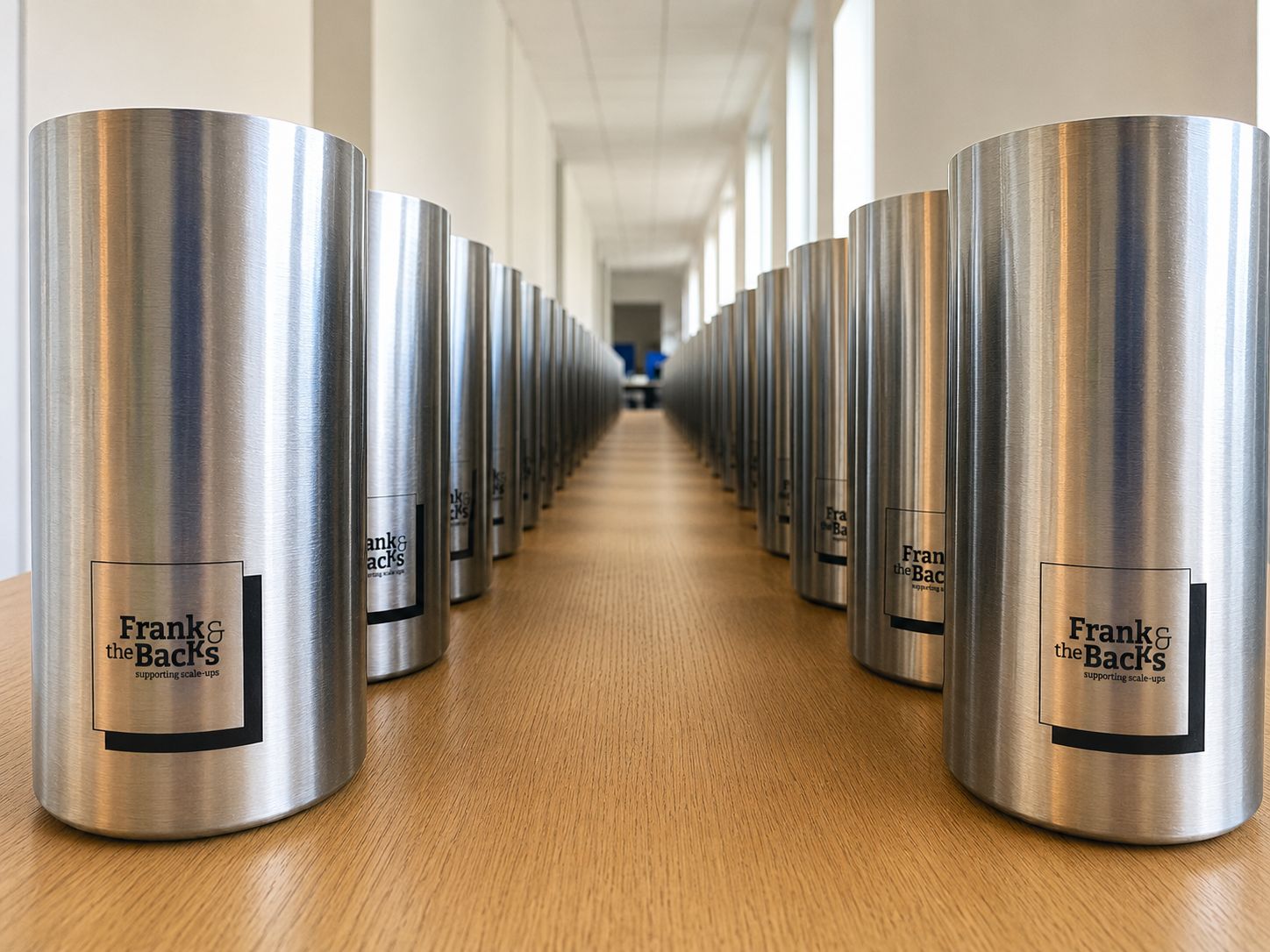 Corporate tumblers engraved with a company logo